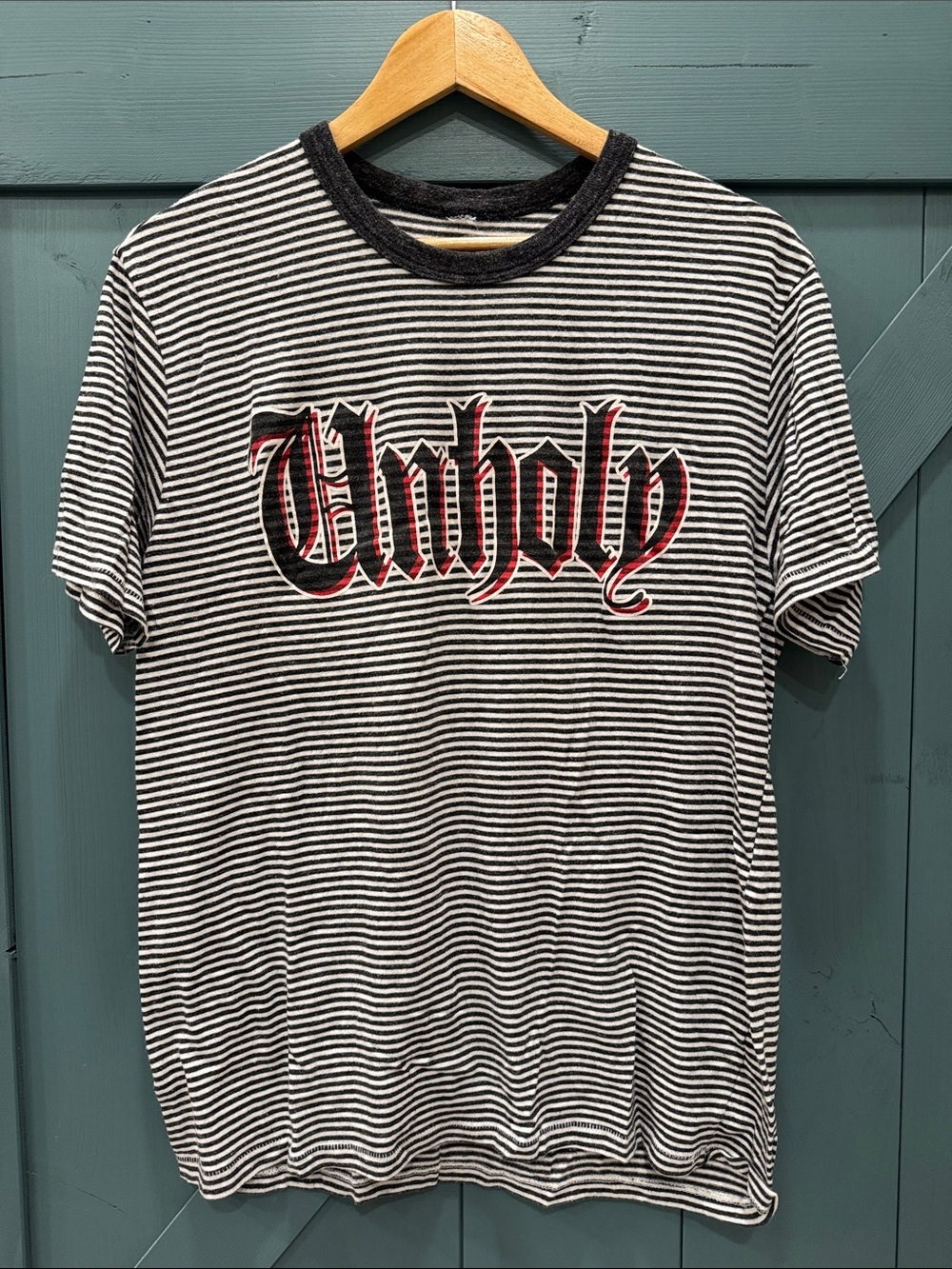 Men's Black & White Striped Graphic Tee with 'Unholy' Print
